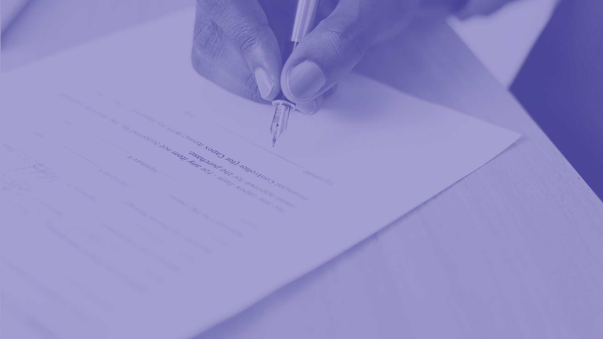 A person is signing a housing contract