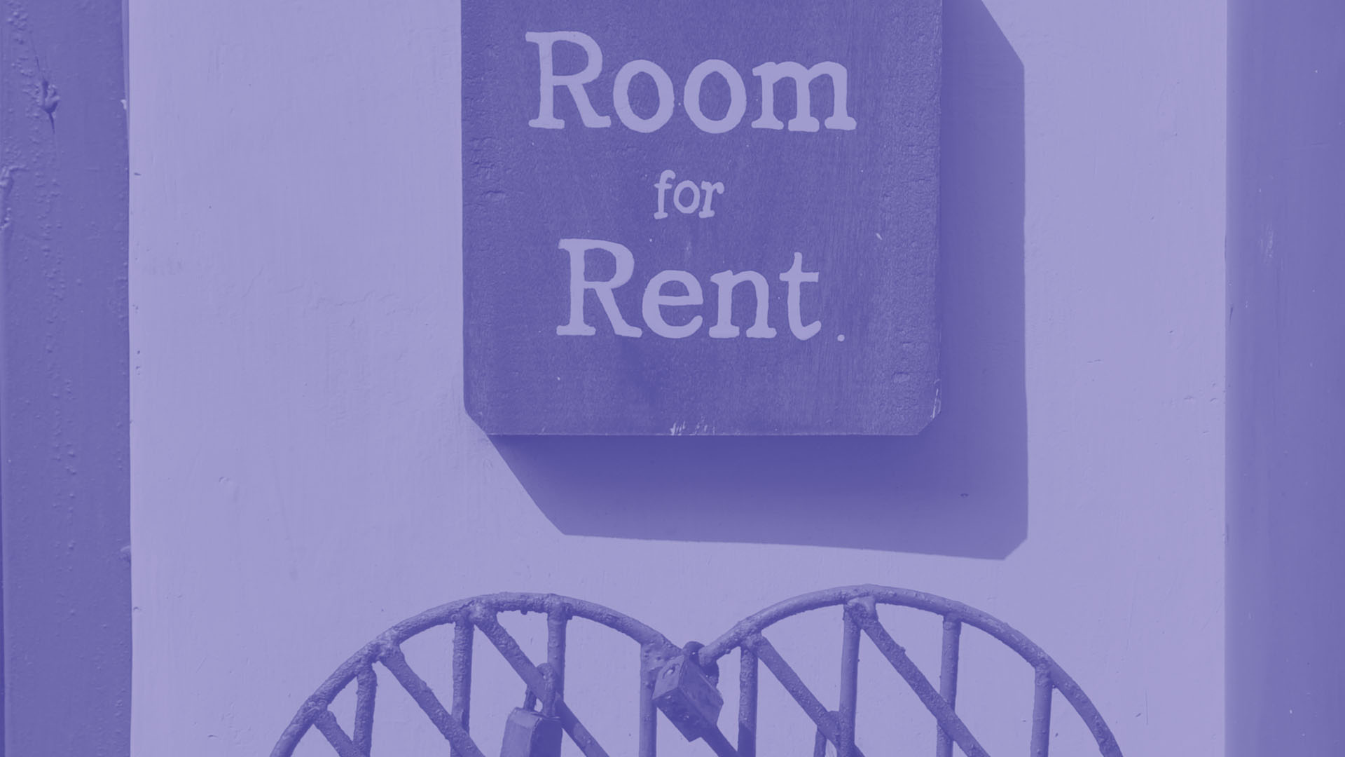 A sign saying 'Room for Rend' is displayed outside a house