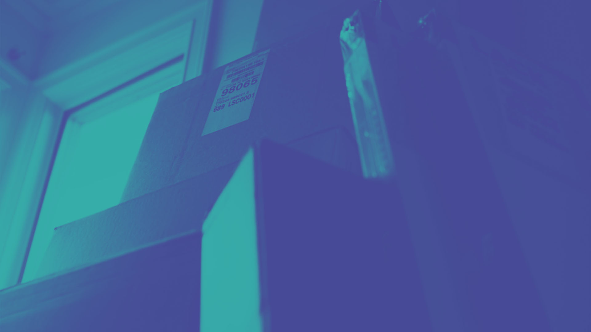 Boxes are stacked up at the front door ready to move out