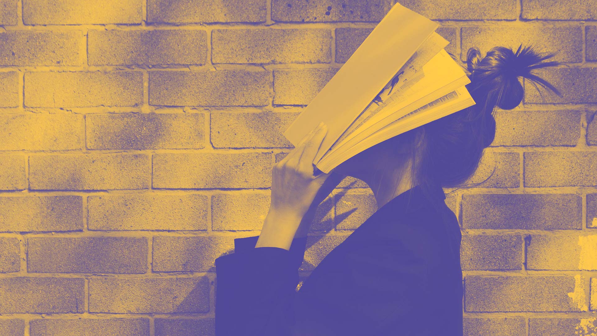 A student throwing their head back in frustration