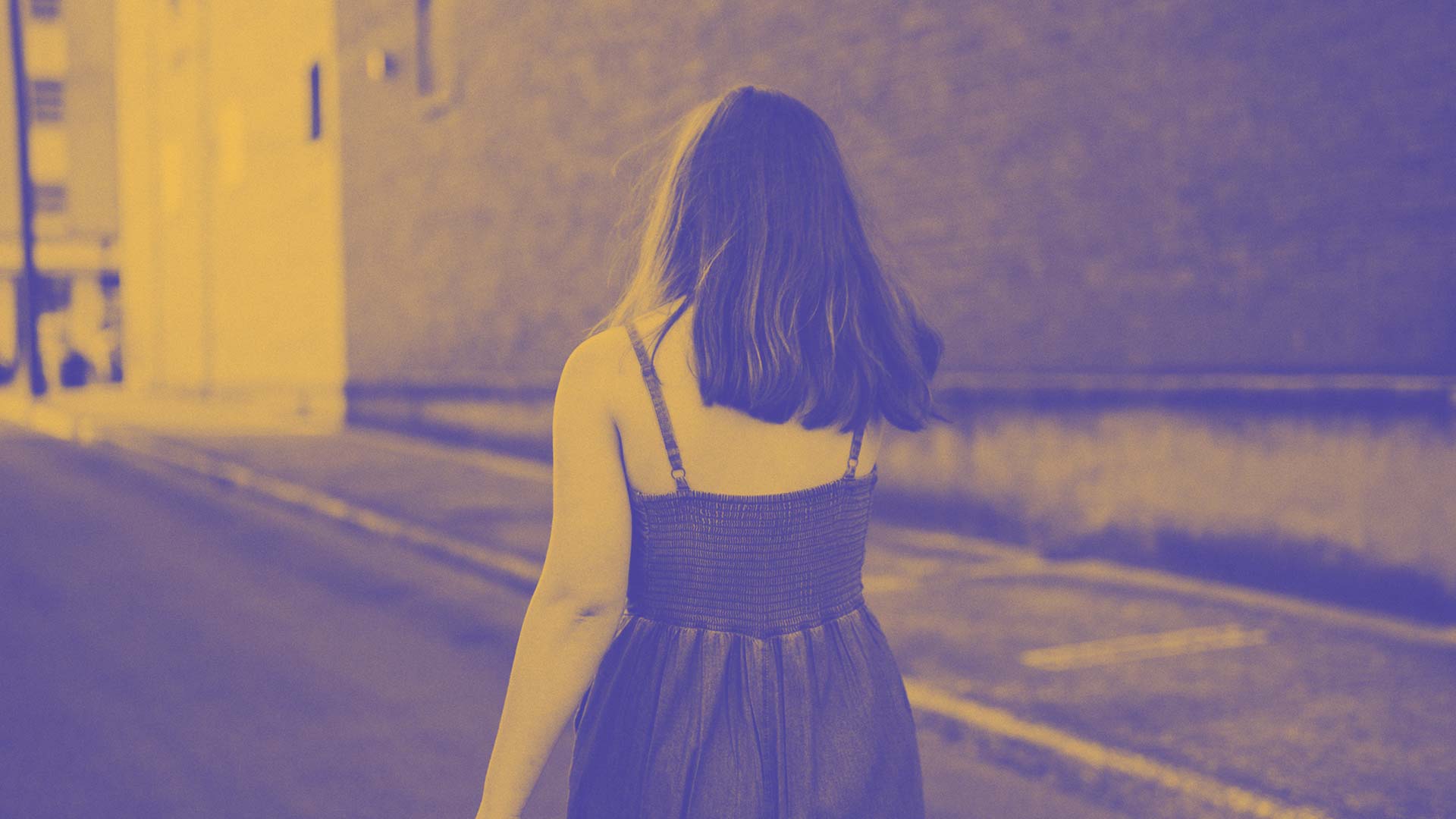 A student walking down the road