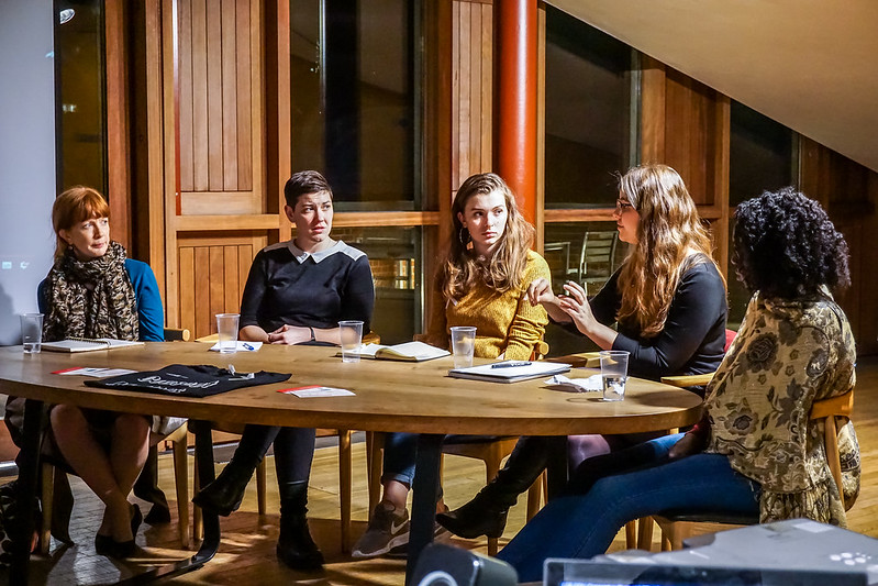 Students sitting on a panel