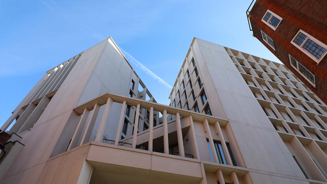 A wide angle shot looking up at the Marshall Building